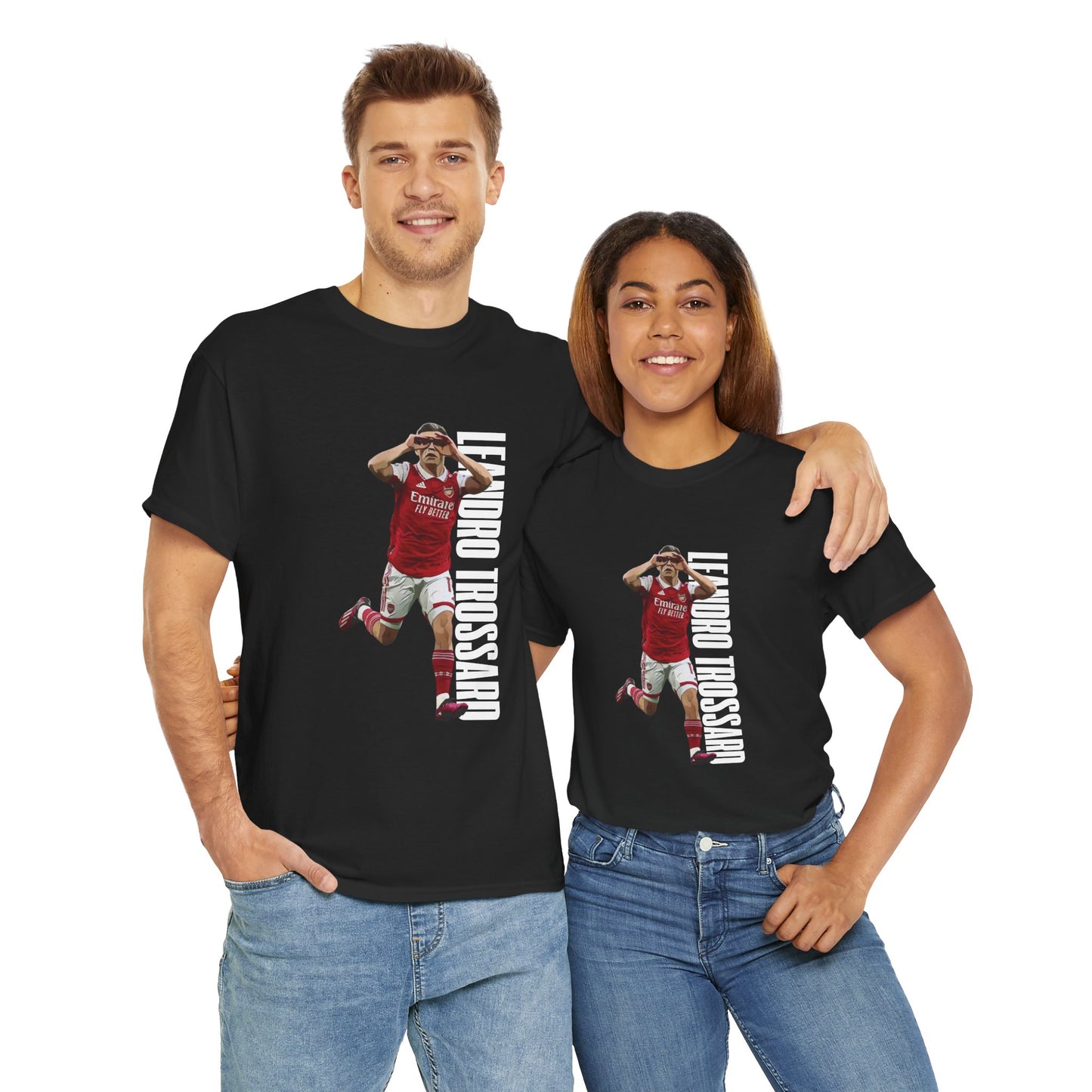 Stand out with this exclusive Arsenal Fan Leandro Trossard T-shirt with our unique© Design. Perfect gift for a Gooner, wearable Arsenal Art present showing your love for the Gunners. 
Leandro Trossard is a Belgian forward known for his flair, creativity, and goal-scoring ability. Since joining Arsenal from Brighton in January 2023, he has become a vital player under Mikel Arteta, delivering goals, assists, and versatility across the front line. Leandro Trossard | Arsenal Player Leandro Trossard | Leandro Tr